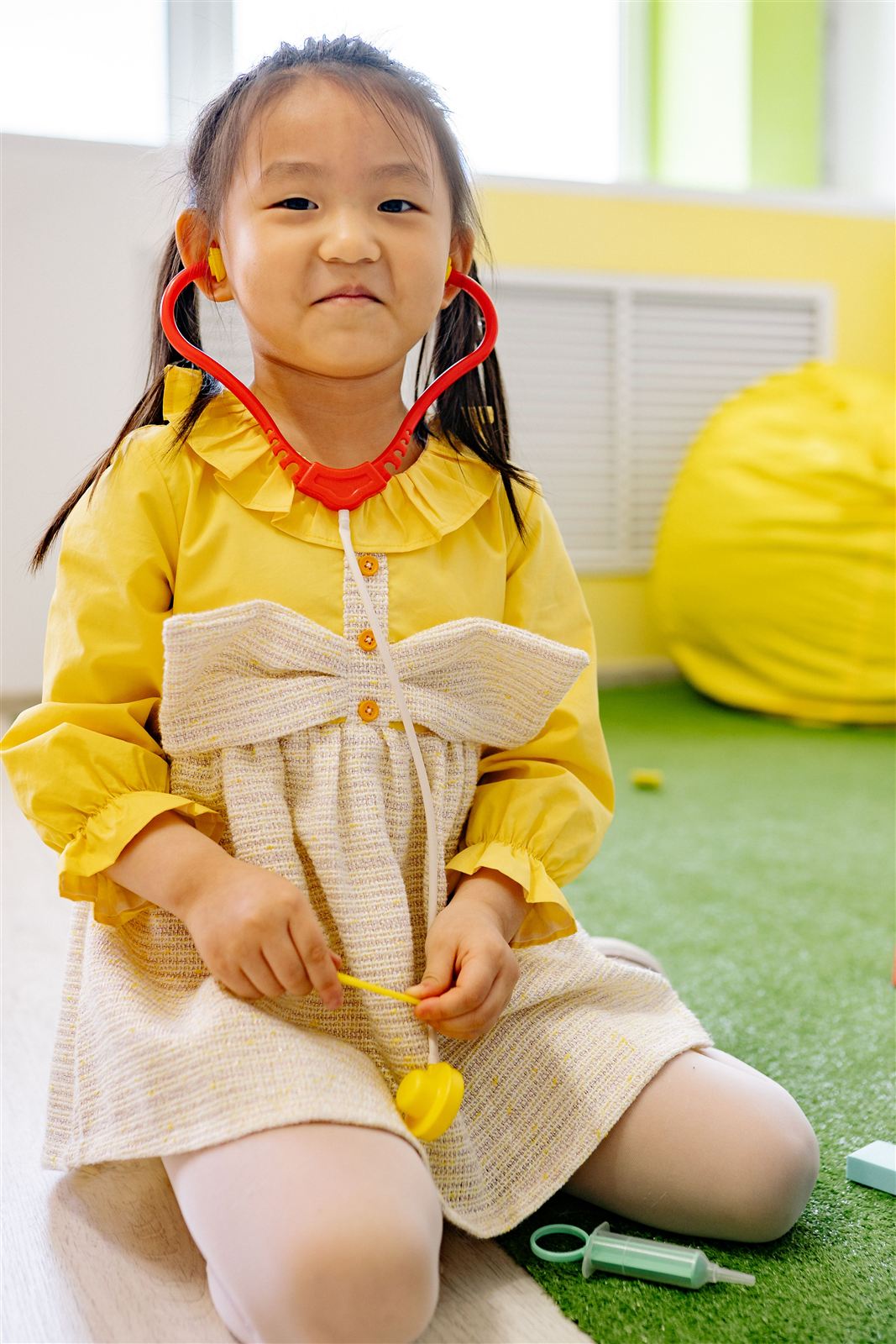 Children on outdoor play equipment